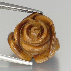 Tiger's Eye طبيعي بلون بنى متوسط، وزن ‎9.87‎ قيراط، شكل شكل خيالي، مقاس ‎14.6x13.7‎ مم