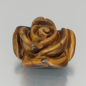 Tiger's Eye طبيعي بلون بنى خبز الزنجبيل، وزن ‎12.16‎ قيراط، شكل شكل خيالي، مقاس ‎16x14.5‎ مم