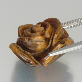 Tiger's Eye طبيعي بلون بنى خبز الزنجبيل، وزن ‎12.16‎ قيراط، شكل شكل خيالي، مقاس ‎16x14.5‎ مم