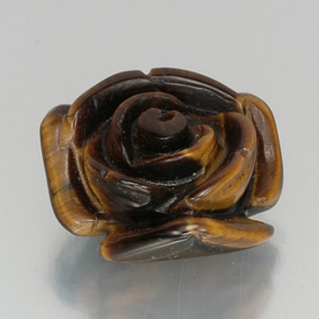 Tiger's Eye طبيعي بلون بني، وزن ‎12.19‎ قيراط، شكل شكل خيالي، مقاس ‎16.2x15.4‎ مم