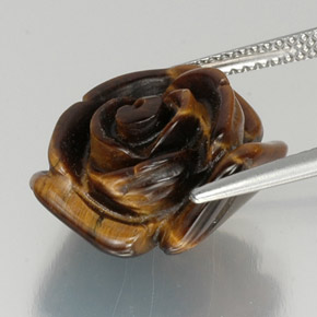 Tiger's Eye طبيعي بلون بني، وزن ‎12.19‎ قيراط، شكل شكل خيالي، مقاس ‎16.2x15.4‎ مم