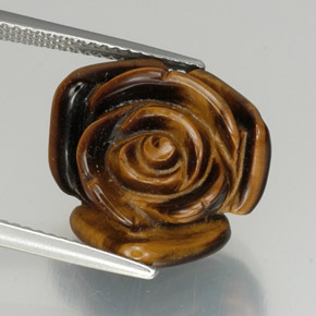 Tiger's Eye طبيعي بلون بني ذهبي، وزن ‎11.57‎ قيراط، شكل شكل خيالي، مقاس ‎15.7x15.5‎ مم