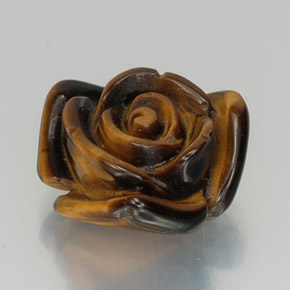 Tiger's Eye طبيعي بلون بني ذهبي، وزن ‎11.57‎ قيراط، شكل شكل خيالي، مقاس ‎15.7x15.5‎ مم