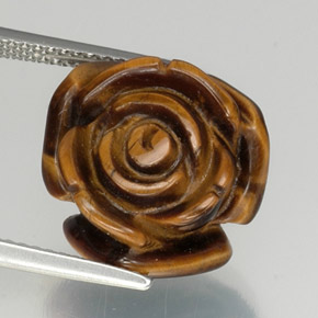 Tiger's Eye طبيعي بلون بنى دافئ، وزن ‎11.77‎ قيراط، شكل شكل خيالي، مقاس ‎15.1x14.7‎ مم