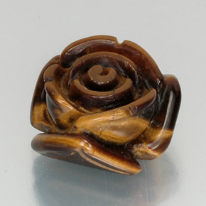 Tiger's Eye طبيعي بلون بنى دافئ، وزن ‎11.77‎ قيراط، شكل شكل خيالي، مقاس ‎15.1x14.7‎ مم