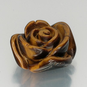 Tiger's Eye طبيعي بلون بني ذهبي، وزن ‎12.51‎ قيراط، شكل شكل خيالي، مقاس ‎15.7x14.5‎ مم