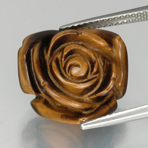 Tiger's Eye طبيعي بلون بني ذهبي، وزن ‎12.07‎ قيراط، شكل شكل خيالي، مقاس ‎16.3x15.2‎ مم