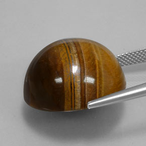 Tiger's Eye طبيعي بلون بنى متوسط، وزن ‎35.03‎ قيراط، شكل دائري، مقاس ‎20.04‎ مم