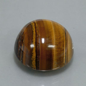 Tiger's Eye طبيعي بلون بني ذهبي، وزن ‎37.12‎ قيراط، شكل دائري، مقاس ‎20.19‎ مم
