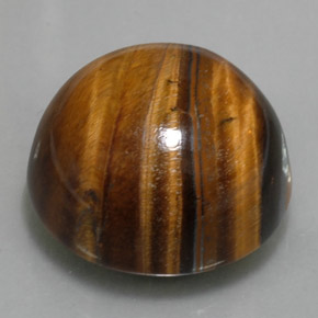 Tiger's Eye طبيعي بلون بني ذهبي، وزن ‎36.96‎ قيراط، شكل دائري، مقاس ‎20.12‎ مم