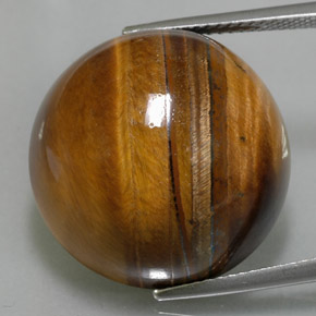 Tiger's Eye طبيعي بلون بني ذهبي، وزن ‎36.05‎ قيراط، شكل دائري، مقاس ‎20.11‎ مم