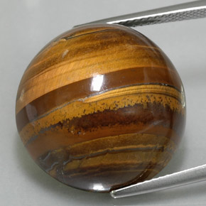 Tiger's Eye طبيعي بلون بني ذهبي، وزن ‎35.88‎ قيراط، شكل دائري، مقاس ‎20.17‎ مم