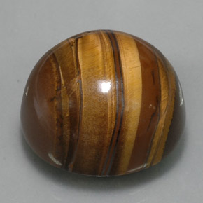 Tiger's Eye طبيعي بلون بني ذهبي، وزن ‎38.33‎ قيراط، شكل دائري، مقاس ‎20.28‎ مم