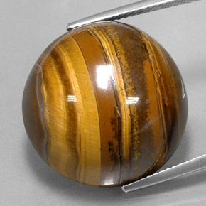 Tiger's Eye طبيعي بلون بني ذهبي، وزن ‎37.72‎ قيراط، شكل دائري، مقاس ‎20.32‎ مم