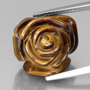 Tiger's Eye طبيعي بلون بني ذهبي، وزن ‎11.36‎ قيراط، شكل شكل خيالي، مقاس ‎15.8x15.6‎ مم