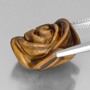Tiger's Eye طبيعي بلون بني ذهبي، وزن ‎11.36‎ قيراط، شكل شكل خيالي، مقاس ‎15.8x15.6‎ مم
