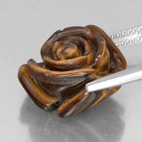 Tiger's Eye طبيعي بلون بني ذهبي، وزن ‎11.87‎ قيراط، شكل شكل خيالي، مقاس ‎15.8x15.4‎ مم