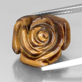 Tiger's Eye طبيعي بلون بني ذهبي، وزن ‎11.19‎ قيراط، شكل شكل خيالي، مقاس ‎15.9x14.5‎ مم