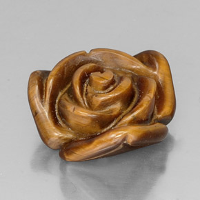 Tiger's Eye طبيعي بلون بني ذهبي، وزن ‎10.20‎ قيراط، شكل شكل خيالي، مقاس ‎15.9x14.8‎ مم