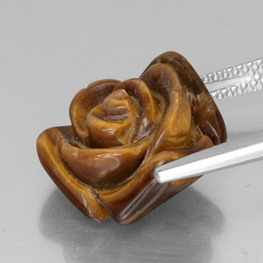 Tiger's Eye طبيعي بلون بني ذهبي، وزن ‎10.20‎ قيراط، شكل شكل خيالي، مقاس ‎15.9x14.8‎ مم