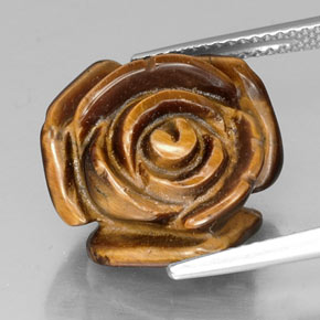 Tiger's Eye طبيعي بلون بني ذهبي، وزن ‎12.80‎ قيراط، شكل شكل خيالي، مقاس ‎16.1x15.9‎ مم