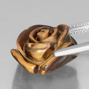 Tiger's Eye طبيعي بلون بني ذهبي، وزن ‎12.80‎ قيراط، شكل شكل خيالي، مقاس ‎16.1x15.9‎ مم