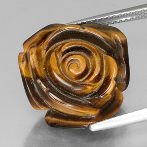 Tiger's Eye طبيعي بلون بني ذهبي، وزن ‎13.91‎ قيراط، شكل شكل خيالي، مقاس ‎16.3x16.1‎ مم