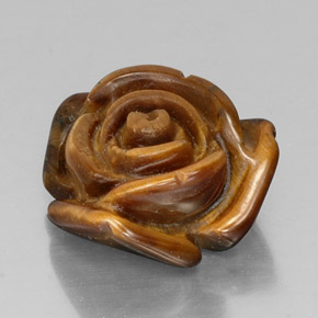Tiger's Eye طبيعي بلون بني ذهبي، وزن ‎11.50‎ قيراط، شكل شكل خيالي، مقاس ‎16.1x15.3‎ مم
