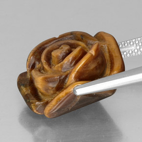Tiger's Eye طبيعي بلون بني ذهبي، وزن ‎11.50‎ قيراط، شكل شكل خيالي، مقاس ‎16.1x15.3‎ مم