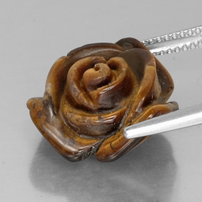 Tiger's Eye طبيعي بلون بني ذهبي، وزن ‎11.25‎ قيراط، شكل شكل خيالي، مقاس ‎15.6x15.1‎ مم