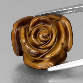Tiger's Eye طبيعي بلون بني ذهبي، وزن ‎11.14‎ قيراط، شكل شكل خيالي، مقاس ‎16x15.8‎ مم