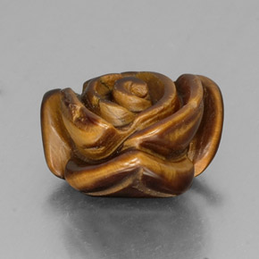 Tiger's Eye طبيعي بلون بني ذهبي، وزن ‎10.77‎ قيراط، شكل شكل خيالي، مقاس ‎15.2x14.7‎ مم