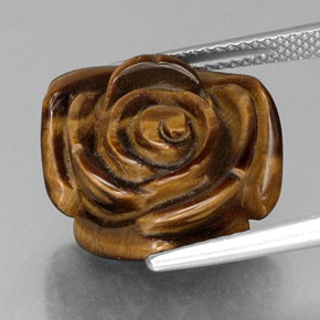 Tiger's Eye طبيعي بلون بني ذهبي، وزن ‎12.84‎ قيراط، شكل شكل خيالي، مقاس ‎16.1x15.8‎ مم