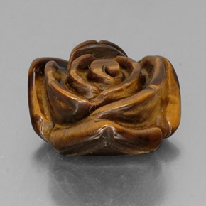 Tiger's Eye طبيعي بلون بني ذهبي، وزن ‎12.84‎ قيراط، شكل شكل خيالي، مقاس ‎16.1x15.8‎ مم
