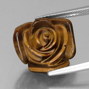 Tiger's Eye طبيعي بلون بني ذهبي، وزن ‎9.49‎ قيراط، شكل شكل خيالي، مقاس ‎15.4x14.9‎ مم
