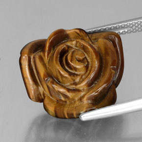 Tiger's Eye طبيعي بلون بني ذهبي، وزن ‎12.82‎ قيراط، شكل شكل خيالي، مقاس ‎16.4x15.2‎ مم