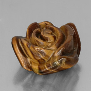Tiger's Eye طبيعي بلون بني ذهبي، وزن ‎12.82‎ قيراط، شكل شكل خيالي، مقاس ‎16.4x15.2‎ مم