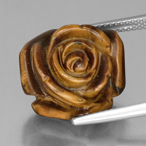 Tiger's Eye طبيعي بلون بني ذهبي، وزن ‎12.52‎ قيراط، شكل شكل خيالي، مقاس ‎15.6x15‎ مم