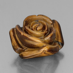Tiger's Eye طبيعي بلون بني ذهبي، وزن ‎12.52‎ قيراط، شكل شكل خيالي، مقاس ‎15.6x15‎ مم