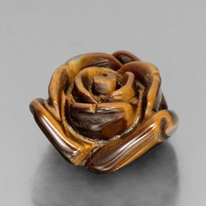 Tiger's Eye طبيعي بلون بني ذهبي، وزن ‎12.07‎ قيراط، شكل شكل خيالي، مقاس ‎16x15.4‎ مم