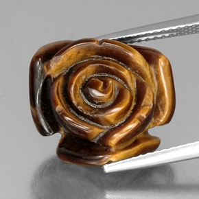 Tiger's Eye طبيعي بلون بني ذهبي، وزن ‎11.74‎ قيراط، شكل شكل خيالي، مقاس ‎15.7x15‎ مم