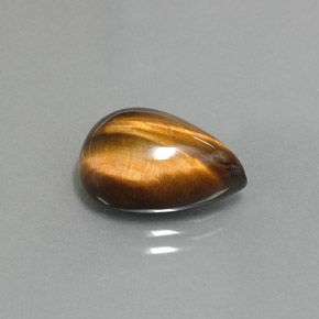 Tiger's Eye طبيعي بلون بني ذهبي، وزن ‎5.67‎ قيراط، شكل شكل الكمثرى، مقاس ‎14.2x10.2‎ مم