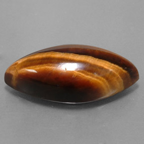 Tiger's Eye طبيعي بلون بني ذهبي، وزن ‎8.51‎ قيراط، شكل ماركيز، مقاس ‎20.3x9.8‎ مم