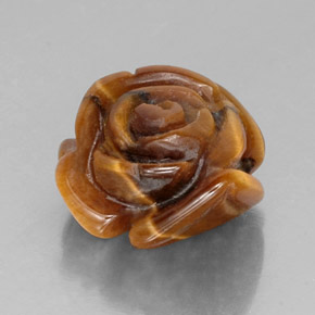 Tiger's Eye طبيعي بلون بني ذهبي، وزن ‎10.22‎ قيراط، شكل شكل خيالي، مقاس ‎15.5x14.5‎ مم