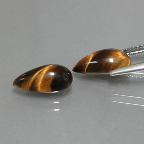 Tiger's Eye طبيعي بلون بني ذهبي، وزن ‎‎ قيراط، شكل شكل الكمثرى، مقاس ‎11.4x6.1‎ مم