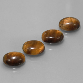 Tiger's Eye طبيعي بلون بني ذهبي، وزن ‎‎ قيراط، شكل بيضاوى، مقاس ‎8.8x6.8‎ مم