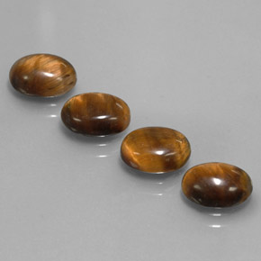 Tiger's Eye طبيعي بلون بني ذهبي، وزن ‎‎ قيراط، شكل بيضاوى، مقاس ‎8.8x6.8‎ مم