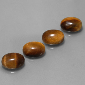 Tiger's Eye طبيعي بلون بني ذهبي، وزن ‎‎ قيراط، شكل بيضاوى، مقاس ‎9x7‎ مم