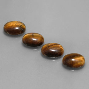 Tiger's Eye طبيعي بلون بني ذهبي، وزن ‎‎ قيراط، شكل بيضاوى، مقاس ‎8.8x6.9‎ مم