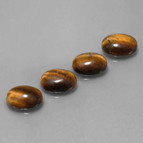 Tiger's Eye طبيعي بلون بني ذهبي، وزن ‎‎ قيراط، شكل بيضاوى، مقاس ‎8.8x6.9‎ مم